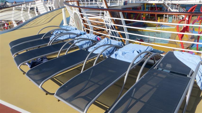 Hogged chairs on a cruise deck
