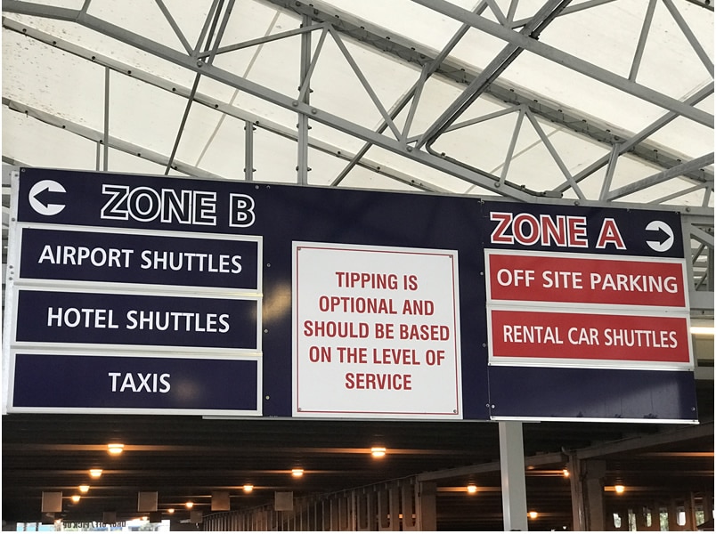 Sign for shuttle to the airport from cruise ship